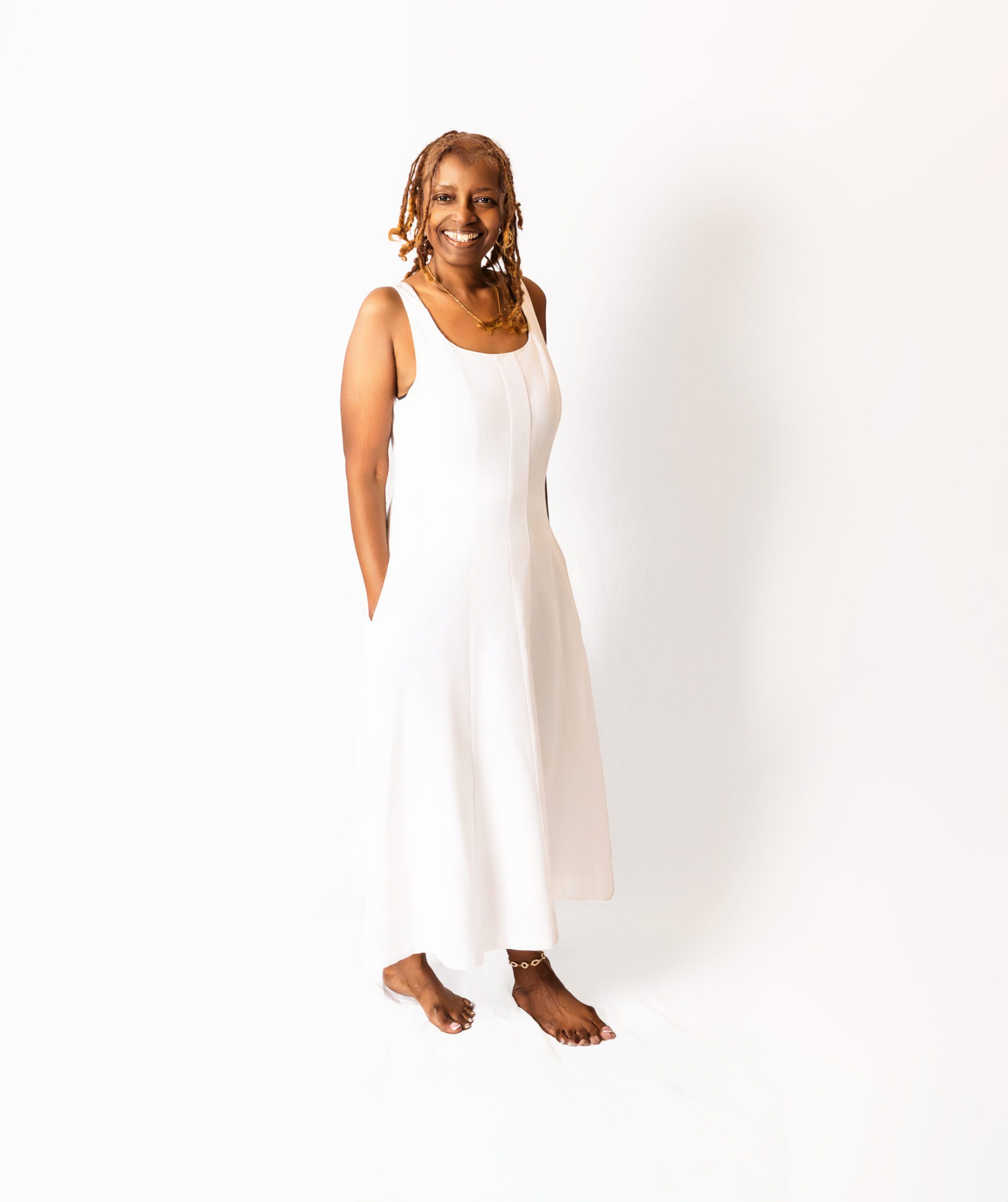 Portrait of a grandmother during a generational family portrait session, smiling warmly