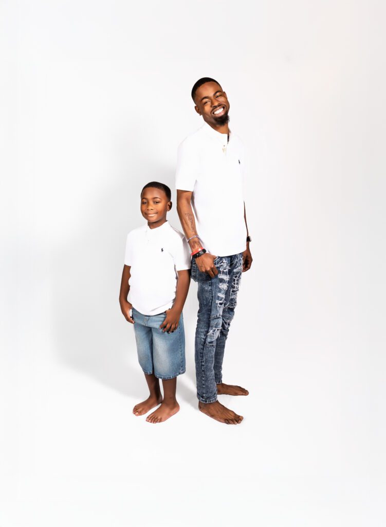 Family portrait of a son, his son during a generational session with Photos By Me'Cshell