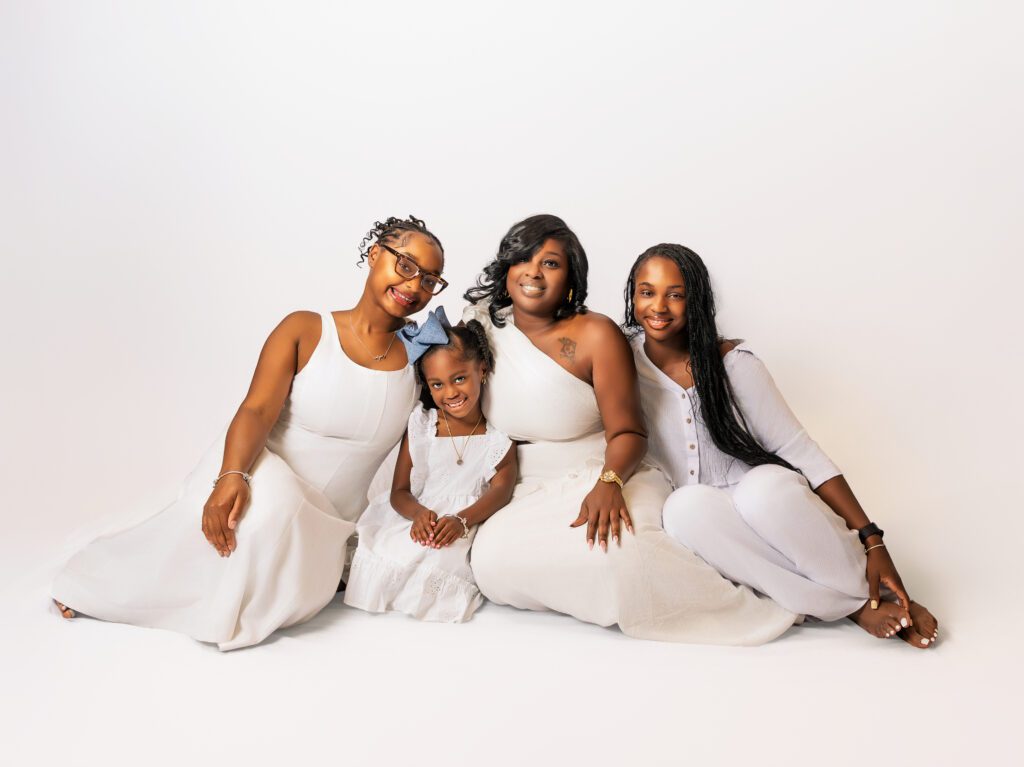 Generational photo of a mother and her children captured during a family portrait session in Walker