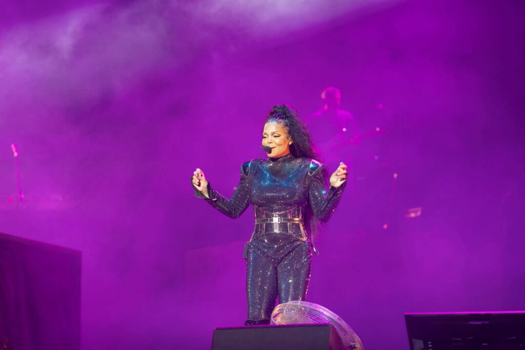 Janet Jackson performing on stage at Essence Festival
